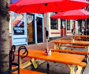 Picnic tables outside the restaurant on a sunny day